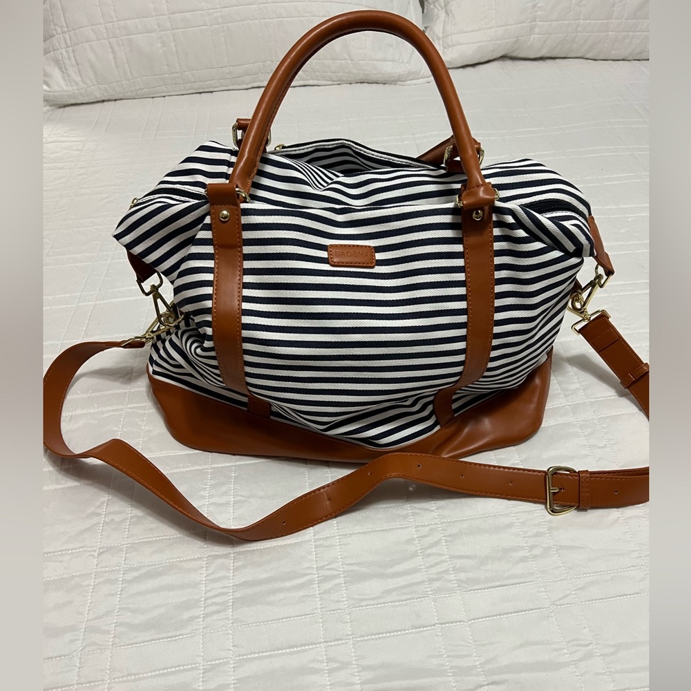 Navy blue & white striped overnight bag. Never used.